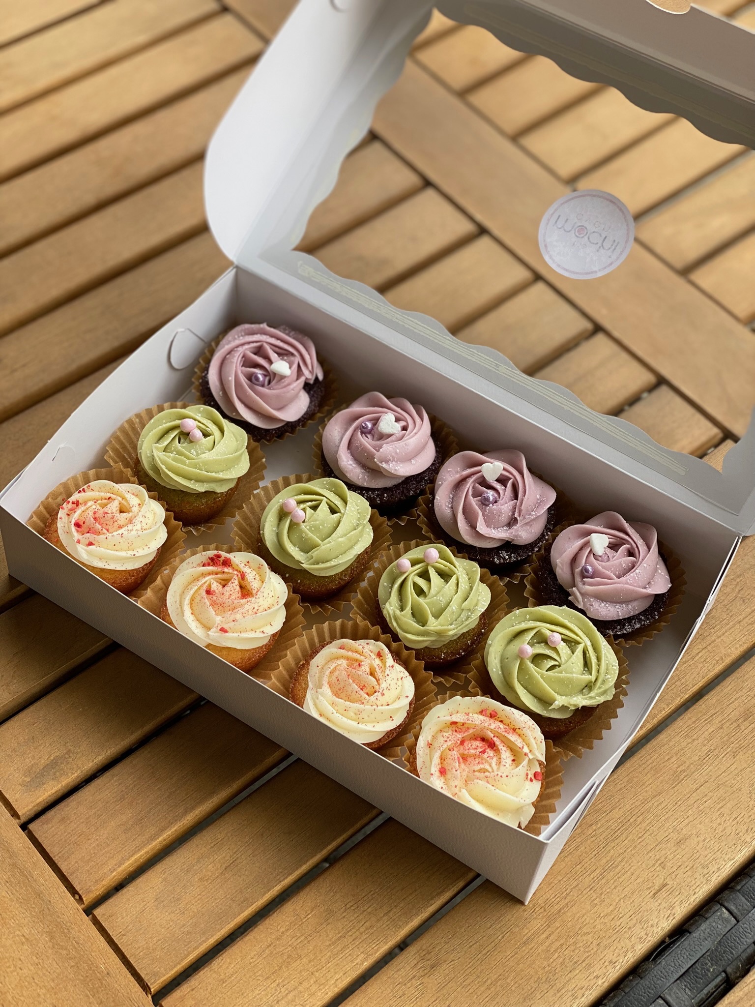 Assorted mini mochi cupcakes topped with buttercream