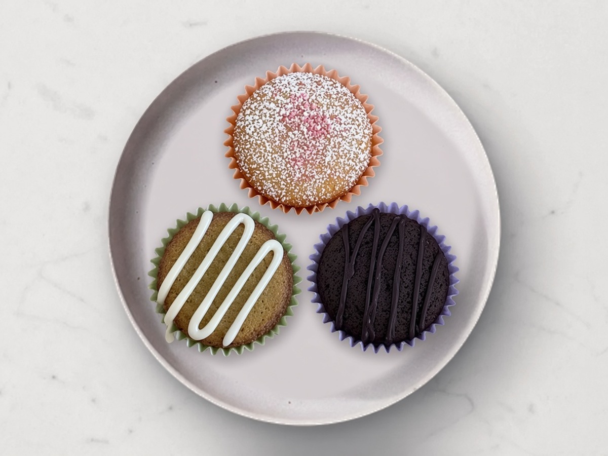 Three Mochi Bites on a plate: Classic Butter, Citrus Matcha, and Velvety Ube